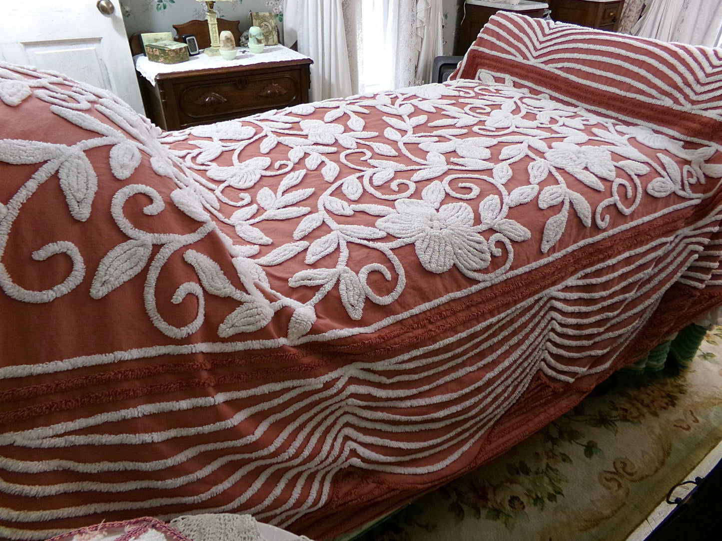 boho floral chenille bedspread, white climbing showy flowers on rusty terracotta vintage hippie 1970s style bedding