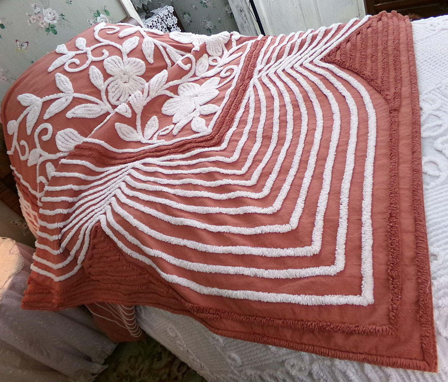 boho floral chenille bedspread, white climbing showy flowers on rusty terracotta vintage hippie 1970s style bedding