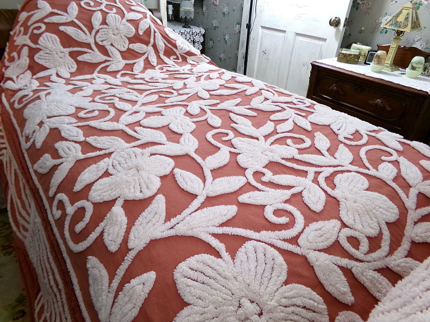 boho floral chenille bedspread, white climbing showy flowers on rusty terracotta vintage hippie 1970s style bedding