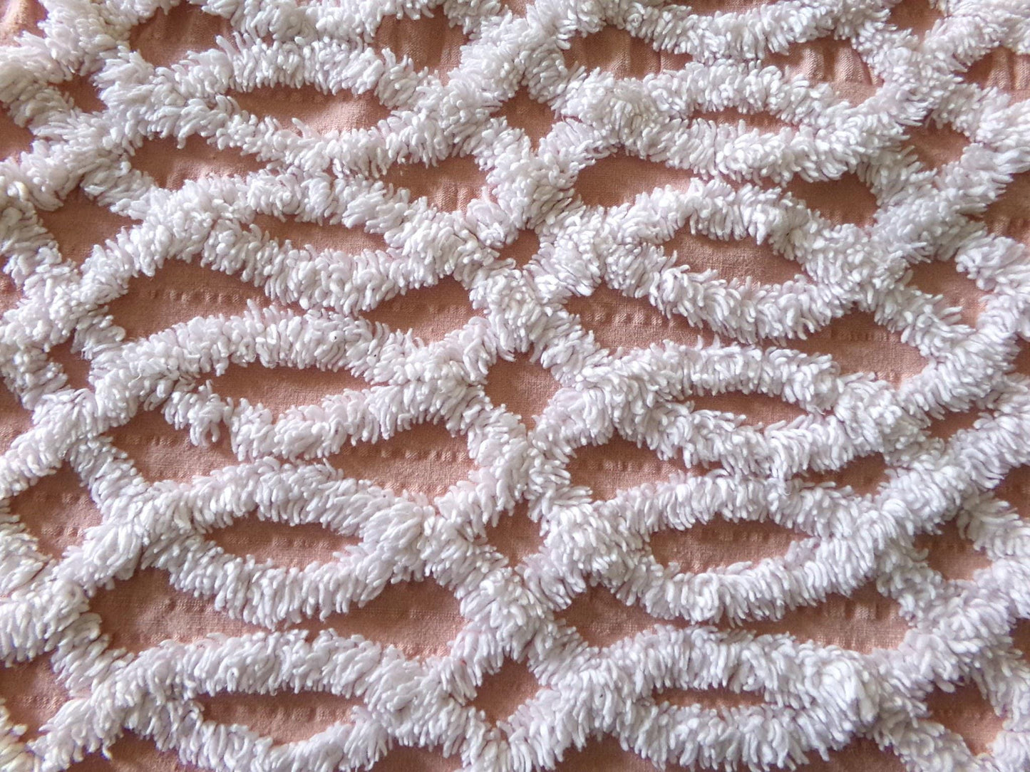plush white eternity link chenille fabric on peach cotton seersucker, 19" x 25" inch piece of sewing material