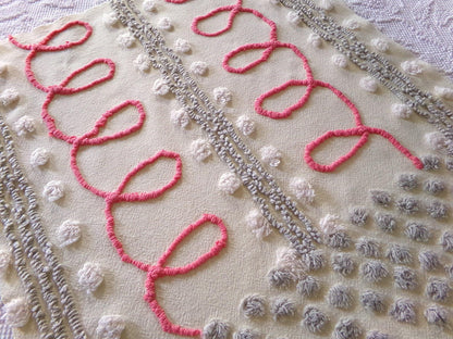red doodles sewing fabric, retro design with grey pops on buttercream, 18" x 24" inch piece cut from a vintage chenille bedspread