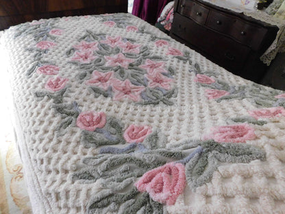 vintage chenille bedspread in a lush garden of pink lilies, buttercream twin size bedding, fitted design with ruffle skirt