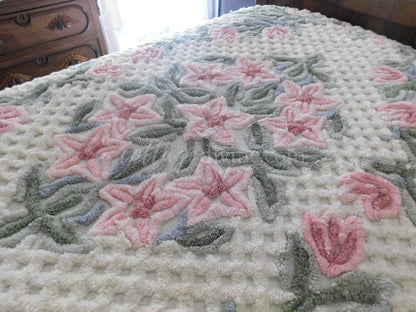 vintage chenille bedspread in a lush garden of pink lilies, buttercream twin size bedding, fitted design with ruffle skirt