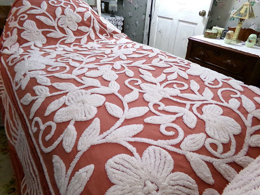boho floral chenille bedspread, white climbing showy flowers on rusty terracotta vintage hippie 1970s style bedding